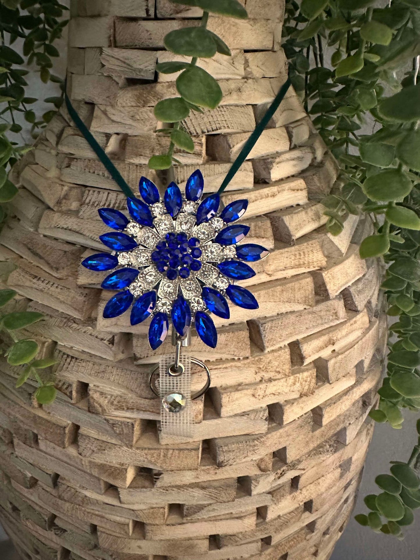 Rhinestone blue badge reel/key chain on heavy duty reel